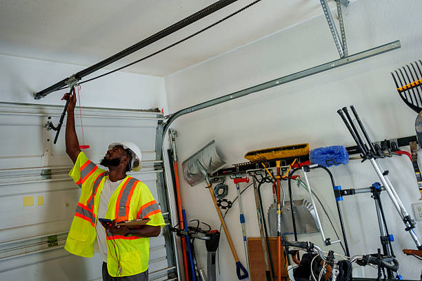 Professional Garage Door Panel Replacement technician working in Heyburn, ID